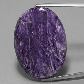 25.13캐럿 천연 바이올렛 차로아이트, 타원형 컷, 30.2×22.1 mm, 불투명체