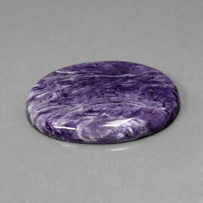 25.13캐럿 천연 바이올렛 차로아이트, 타원형 컷, 30.2×22.1 mm, 불투명체
