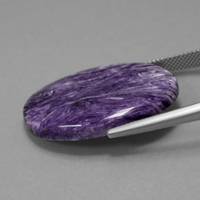 25.13캐럿 천연 바이올렛 차로아이트, 타원형 컷, 30.2×22.1 mm, 불투명체