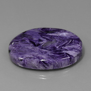 84.76캐럿 천연 바이올렛 차로아이트, 타원형 컷, 42.2×30.6 mm, 불투명체