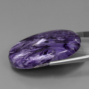84.76캐럿 천연 바이올렛 차로아이트, 타원형 컷, 42.2×30.6 mm, 불투명체