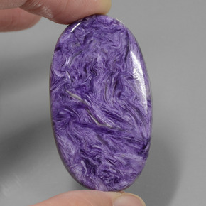 52.34캐럿 천연 바이올렛 차로아이트, 타원형 컷, 41.5×23.9 mm, 불투명체
