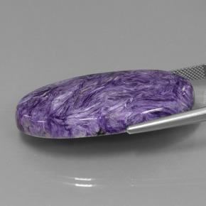 52.34캐럿 천연 바이올렛 차로아이트, 타원형 컷, 41.5×23.9 mm, 불투명체