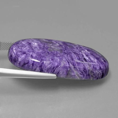 49.22캐럿 천연 딥 바이올렛 차로아이트, 타원형 컷, 38.5×20.7 mm, 불투명체