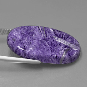 53.84캐럿 천연 바이올렛 차로아이트, 타원형 컷, 38.6×23.2 mm, 불투명체