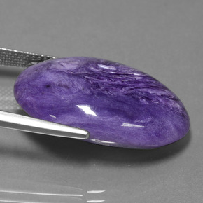 22.88캐럿 천연 바이올렛 차로아이트, 타원형 컷, 25.4×18.3 mm, 불투명체