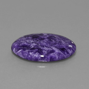 15.55캐럿 천연 바이올렛 차로아이트, 타원형 컷, 25.1×18.2 mm, 불투명체
