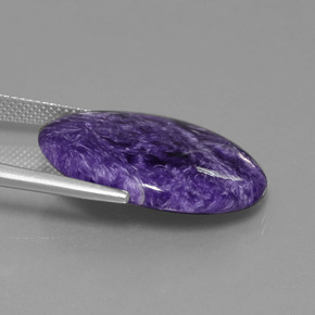 15.55캐럿 천연 바이올렛 차로아이트, 타원형 컷, 25.1×18.2 mm, 불투명체