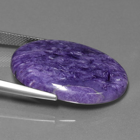 27.82캐럿 천연 바이올렛 차로아이트, 타원형 컷, 30.2×22.1 mm, 불투명체