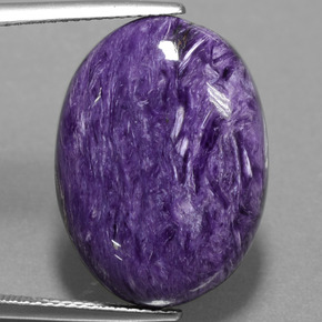 15.38캐럿 천연 바이올렛 차로아이트, 타원형 컷, 22.2×16.2 mm, 불투명체