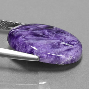 13.36캐럿 천연 바이올렛 차로아이트, 타원형 컷, 22.2×15.9 mm, 불투명체