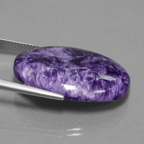 29.03캐럿 천연 바이올렛 차로아이트, 타원형 컷, 30.2×21.9 mm, 불투명체