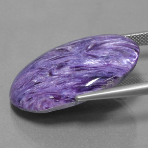 31.73캐럿 천연 바이올렛 차로아이트, 타원형 컷, 30.5×22.7 mm, 불투명체