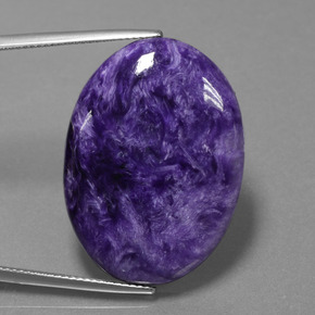 27.61캐럿 천연 바이올렛 차로아이트, 타원형 컷, 30.3×22.3 mm, 불투명체