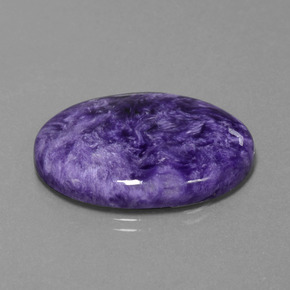 27.61캐럿 천연 바이올렛 차로아이트, 타원형 컷, 30.3×22.3 mm, 불투명체