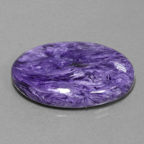 30.97캐럿 천연 바이올렛 차로아이트, 타원형 컷, 30.1×22.1 mm, 불투명체
