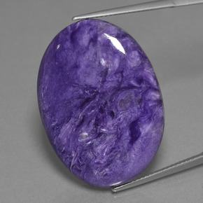 30.48캐럿 천연 바이올렛 차로아이트, 타원형 컷, 30.2×22.2 mm, 불투명체