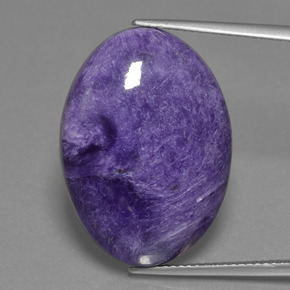 20.32캐럿 천연 바이올렛 차로아이트, 타원형 컷, 25.3×18.3 mm, 불투명체