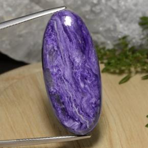 27.33캐럿 천연 미디엄 다크 바이올렛 차로아이트, 타원형 컷, 34.1×15.3 mm, 불투명체