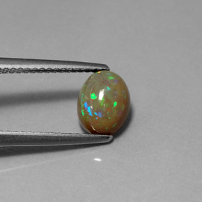 1.03캐럿 천연 멀티컬러 초콜릿 오팔, 투명한, 8×6.2 mm, 투명/반투명