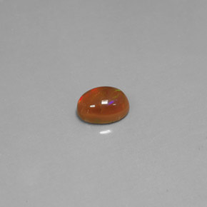 0.63캐럿 천연 멀티컬러 초콜릿 오팔, 투명한, 7×5.1 mm, 투명/반투명