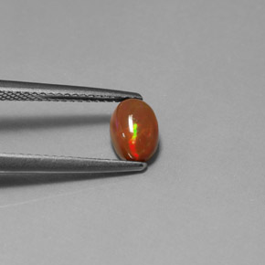 0.63캐럿 천연 멀티컬러 초콜릿 오팔, 투명한, 7×5.1 mm, 투명/반투명