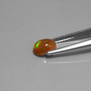 0.63캐럿 천연 멀티컬러 초콜릿 오팔, 투명한, 7×5.1 mm, 투명/반투명