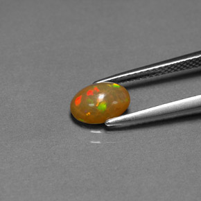 0.68캐럿 천연 멀티컬러 초콜릿 오팔, 투명한, 7.9×5.9 mm, 투명/반투명