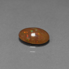 0.83캐럿 천연 멀티컬러 초콜릿 오팔, 타원형 컷, 9.1×6.9 mm, 불투명체