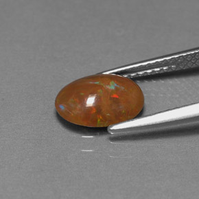 0.83캐럿 천연 멀티컬러 초콜릿 오팔, 타원형 컷, 9.1×6.9 mm, 불투명체