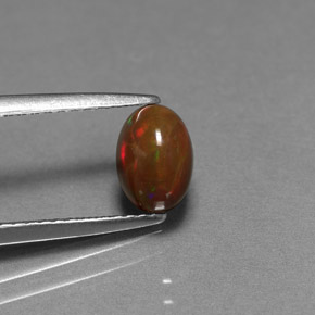 0.77캐럿 천연 멀티컬러 초콜릿 오팔, 타원형 컷, 7.1×5 mm, 불투명체