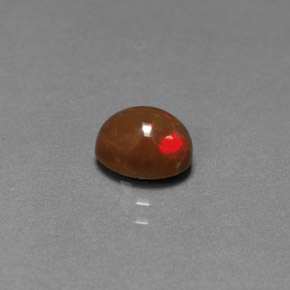 0.77캐럿 천연 멀티컬러 초콜릿 오팔, 타원형 컷, 7.1×5 mm, 불투명체