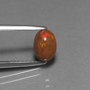 0.69캐럿 천연 다색 초콜릿 오팔, 타원형 컷, 불투명체