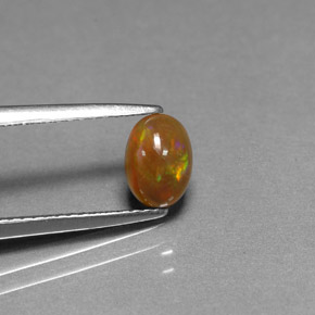 0.54캐럿 천연 다색 초콜릿 오팔, 타원형 컷, 불투명체