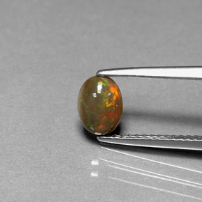 0.46캐럿 천연 멀티컬러 초콜릿 오팔, 타원형 컷, 7.1×5.2 mm, 불투명체