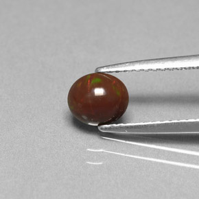 0.44캐럿 천연 멀티컬러 초콜릿 오팔, 타원형 컷, 6.3×5.5 mm, 불투명체