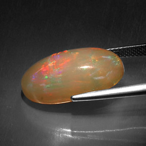 10.52캐럿 천연 멀티컬러 초콜릿 오팔, 타원형 컷, 21.7×12.8 mm, 불투명체