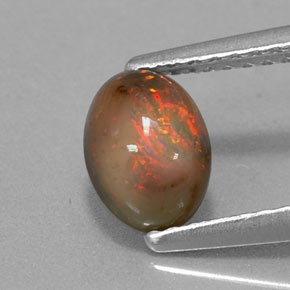0.69캐럿 천연 멀티컬러 초콜릿 오팔, 타원형 컷, 7.1×5.1 mm, 투명한