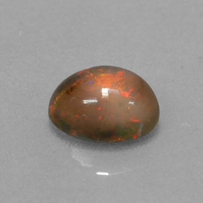 0.69캐럿 천연 멀티컬러 초콜릿 오팔, 타원형 컷, 7.1×5.1 mm, 투명한