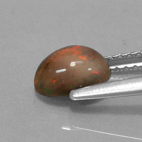 0.69캐럿 천연 멀티컬러 초콜릿 오팔, 타원형 컷, 7.1×5.1 mm, 투명한