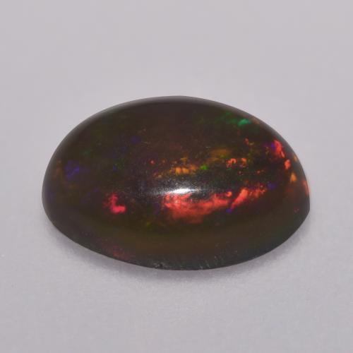 0.67캐럿 천연 멀티컬러 초콜릿 오팔, 타원형 컷, 8×6.1 mm, 투명한