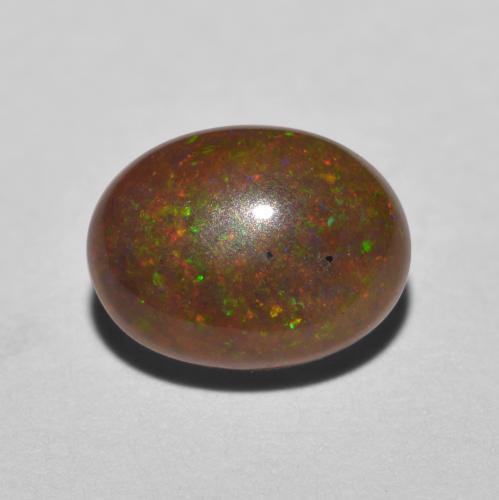 0.85캐럿 천연 멀티컬러 초콜릿 오팔, 타원형 컷, 8×6.1 mm, 투명한
