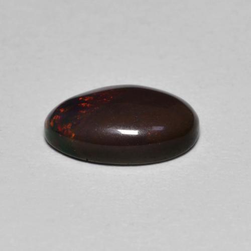 0.80캐럿 천연 멀티컬러 초콜릿 오팔, 타원형 컷, 9×6 mm, 투명한
