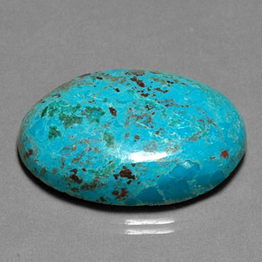 26.90캐럿 천연 멀티컬러 크리소콜라, 타원형 컷, 28.4×19.5 mm, 불투명체