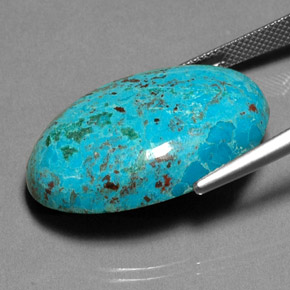 26.90캐럿 천연 멀티컬러 크리소콜라, 타원형 컷, 28.4×19.5 mm, 불투명체