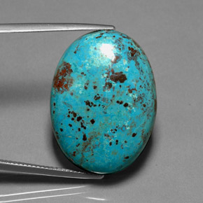 25.30캐럿 천연 멀티컬러 크리소콜라, 타원형 컷, 27.6×20.7 mm, 불투명체