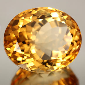 27.06캐럿 천연 골든 오렌지 시트린, 타원형 컷, 19.9×16.4 mm, VVS