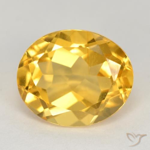 4.71ct 자연스러운 미디엄 골드 황수정, 타원형, VS