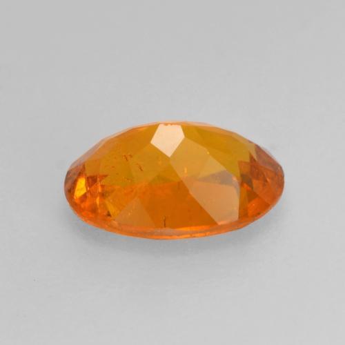 0.82캐럿 천연 사이다 오렌지 클리노휴마이트, 타원형 컷, 7.1×5.2 mm, SI