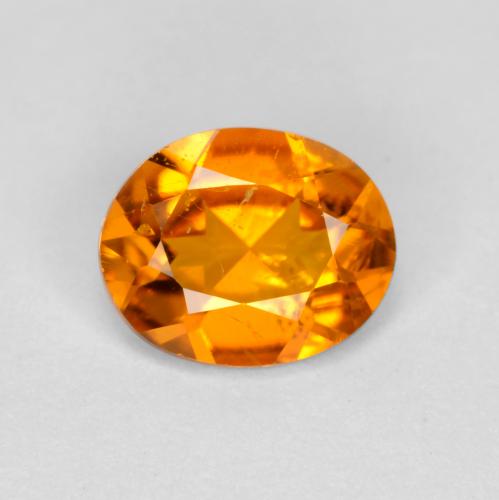 0.54캐럿 천연 살구 오렌지 클리노휴마이트, 타원형 컷, 6.1×4.9 mm, SI